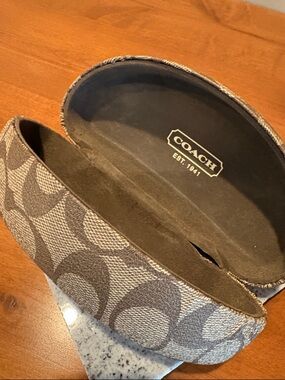 Coach glass case.